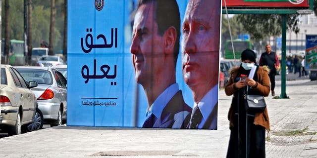 Assad and Putin billboard