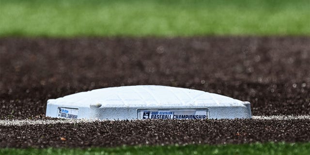 Third base at Lindsey Nelson Stadium displaying the 2022 Division I Baseball Championship logo before Game 3 of the NCAA Super Regionals between the Tennessee Volunteers and Notre Dame Fighting Irish June 12, 2022, at Lindsey Nelson Stadium in Knoxville, Tenn.