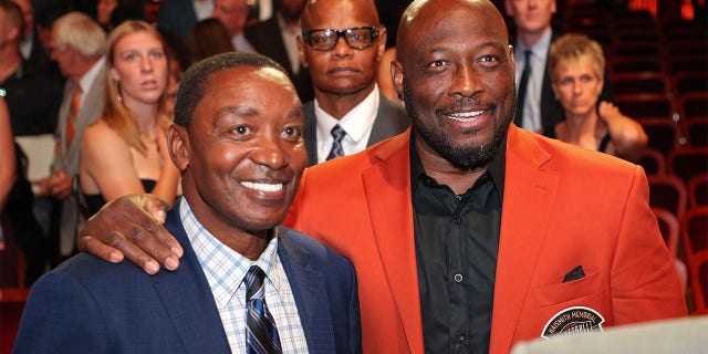 Isiah Thomas and Mitch Richmond pose for a photo during the 2022 Basketball Hall of Fame enshrinement ceremony Sept. 10, 2022, at Symphony Hall in Springfield, Mass.