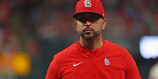Manager Oliver Marmol of the Cardinals returns to the dugout after a pitching change against the Pittsburgh Pirates at Busch Stadium on Oct. 1, 2022, in St Louis.