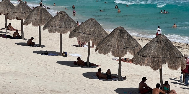 A photo of people at the beach