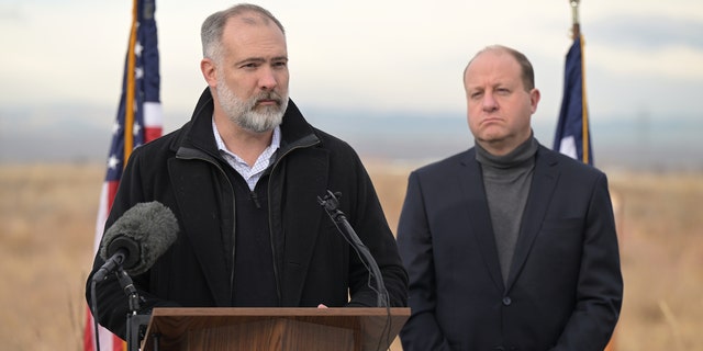 Deputy Secretary of the Interior Tommy Beaudreau speaks alongside Colorado Gov. Jared Polis in Commerce City, Colorado, on Dec. 14, 2022.