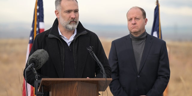 Deputy Secretary of the Interior Tommy Beaudreau speaks alongside Colorado Gov. Jared Polis in Commerce City, Colorado, on Dec. 14, 2022.