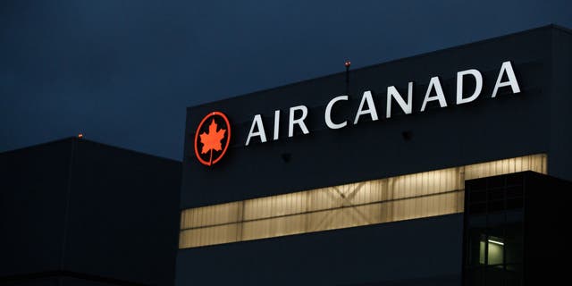 Air Canada signage on the side of a building at Toronto Pearson International Airport (YYZ) in Toronto, Ontario, Canada, on Thursday, Jan. 18, 2023.