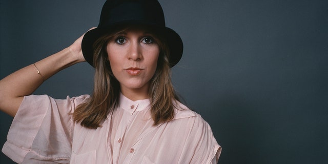 Carrie Fisher wearing a hat