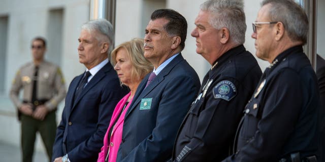 From left, Los Angeles County District Attorney George Gascon, Los Angeles County Supervisor Janice Hahn, Los Angeles County Sheriff Robert Luna, Monterey Park Police Chief Steve Wiese and LAPD Chief Michel Moore take part in a press conference in downtown Los Angeles.