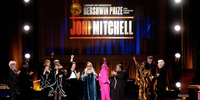 Joni Mitchell was joined onstage by fellow musicians Cyndi Lauper, Brandi Carlile and James Taylor among others to celebrate her Gershwin Prize honor.