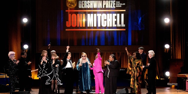 Joni Mitchell was joined onstage by fellow musicians Cyndi Lauper, Brandi Carlile and James Taylor among others to celebrate her Gershwin Prize honor.