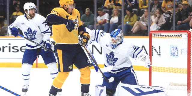 Nashville Predators center Matt Duchene (95) reacts to the deflected puck during the NHL game between the Nashville Predators and Toronto Maple Leafs, held on March 26, 2023, at Bridgestone Arena in Nashville, Tennessee.
