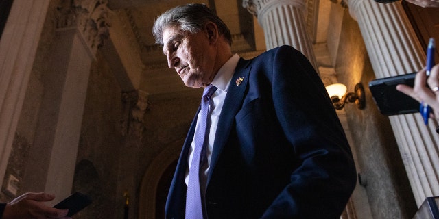 Manchin looking down