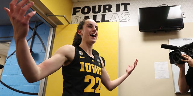 Caitlin Clark, #22 of the Iowa Hawkeyes, celebrate a win over the South Carolina Gamecocks during the semifinals of the NCAA Women's Basketball Tournament Final Four at American Airlines Center on March 31, 2023, in Dallas, Texas.