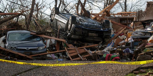 Homes damaged by a tornado in Little Rock, Arkansas. Tornados damaged hundreds of homes and killed at least 22 people across the U.S. this weekend.