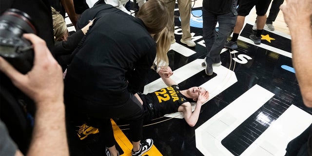 Caitlin Clark, #22, reacts after her victory over the South Carolina Gamecocks during the semifinals of the NCAA Women's Basketball Tournament Final Four at American Airlines Center on March 31, 2023, in Dallas, Texas. 