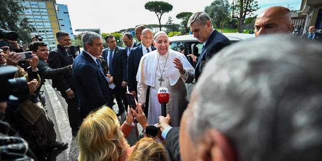 Pope Francis addresses the media as he leaves the Gemelli hospital on April 1, 2023, in Rome, after being discharged following treatment for bronchitis.