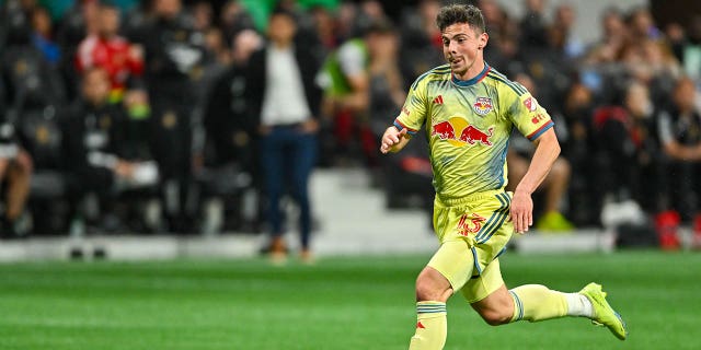 New York forward Dante Vanzeir dribbles the ball during the MLS match against Atlanta United FC on April 1, 2023, at Mercedes-Benz Stadium in Atlanta, Georgia.