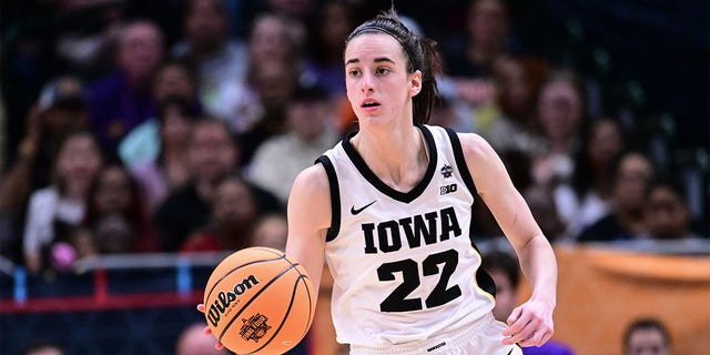 Caitlin Clark, #22 of the Iowa Hawkeyes, dribbles the ball against the Louisiana State Tigers during the 2023 NCAA Women's Basketball Tournament National Championship at American Airlines Center on April 2, 2023, in Dallas, Texas.