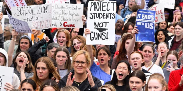 Anti-gun demonstrators protest at the Tennessee Capitol for stricter gun laws in Nashville, Tennessee, on April 3, 2023.
