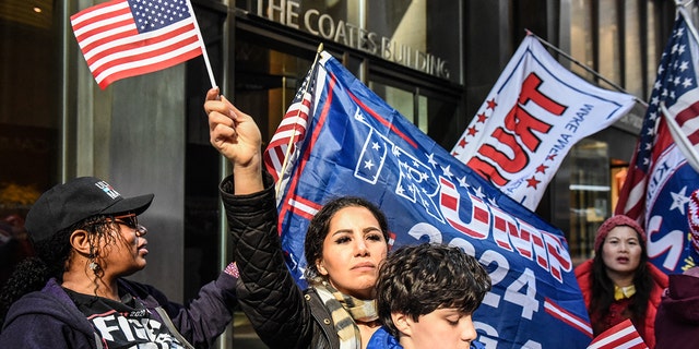 Supporters of former US President Donald Trump outside of Trump Tower in New York, US, on Monday, April 3, 2023.
