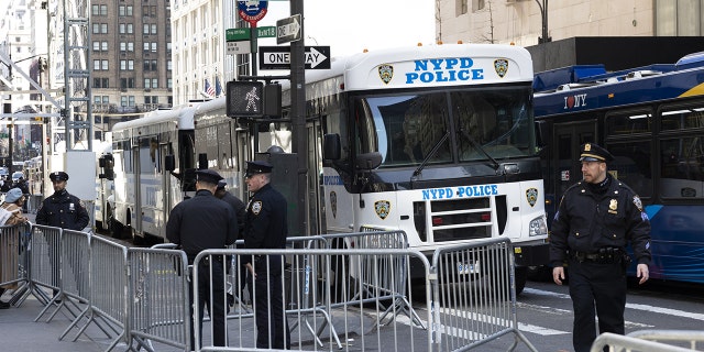 Members of the New York Police Department (NYPD) outside of Trump Tower in New York, US, on Monday, April 3, 2023.