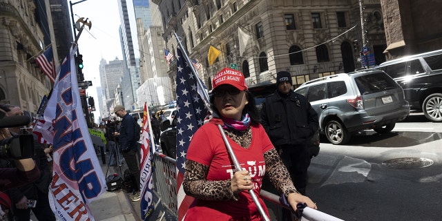 Supporters of former US President Donald Trump outside of Trump Tower in New York, US, on Monday, April 3, 2023.