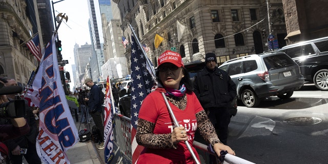 Supporters of former US President Donald Trump outside of Trump Tower in New York, US, on Monday, April 3, 2023. 