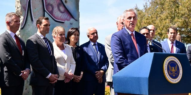 U.S. Speaker of the House Kevin McCarthy, R-Calif., speaks to the press in front of a piece of the Berlin Wall with other lawmakers after a bipartisan meeting with Taiwanese President Tsai Ing-wen at the Ronald Reagan Presidential Library in Simi Valley, Calif., April 5, 2023. 