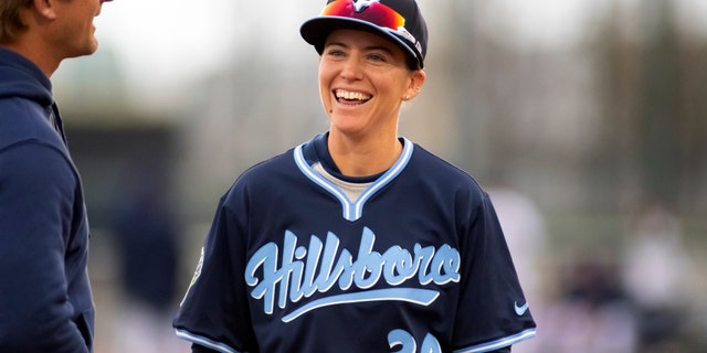 Ronnie Gajownik (34) of the Hillsboro Hops jokes with players before a game at Gesa Stadium Thursday, April 6, 2023, in Paseco, Wash.