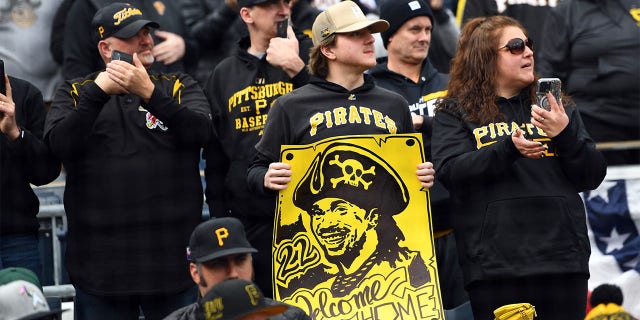 A fan holds a sign featuring Andrew McCutchen during the game between the Chicago White Sox and the Pittsburgh Pirates at PNC Park on Friday, April 7, 2023, in Pittsburgh, Pennsylvania.