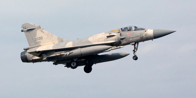 A Taiwanese air force Mirage 2000 fighter jet is seen on final approach for landing at an air force base in Hsinchu, northern Taiwan on April 9, 2023.Â