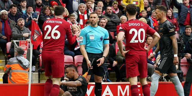 Liverpool's Andrew Robertson appeals to assistant referee Constantine Hatzidakis during the Premier League match at Anfield, Liverpool. Picture date: Sunday April 9, 2023. 