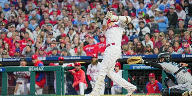 Ohillies right fielder Nick Castellanos hits a double against the Miami Marlins on April 10, 2023, at Citizens Bank Park in Philadelphia.