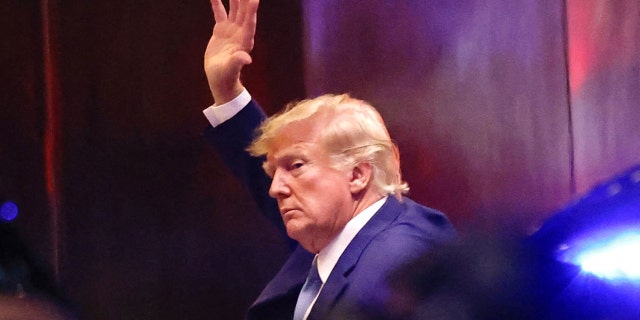 Former President Donald Trump enters Trump Tower in New York on April 12, 2023.