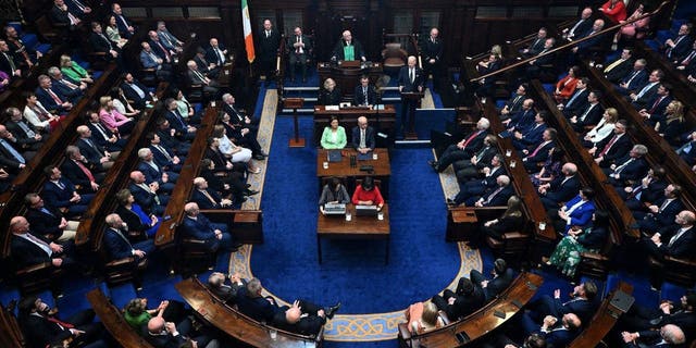 US President Joe Biden delivers a speech at the Dail Eireann, the lower house of the Irish Parliament, at Leinster House in Dublin, on April 13, 2023, during his four-day trip to Northern Ireland and Ireland. 