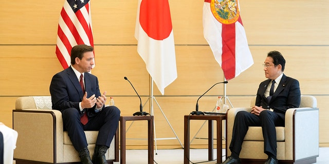 DeSantis sitting with Japan's leader