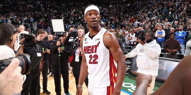 Jimmy Butler looks on after beating the Bucks