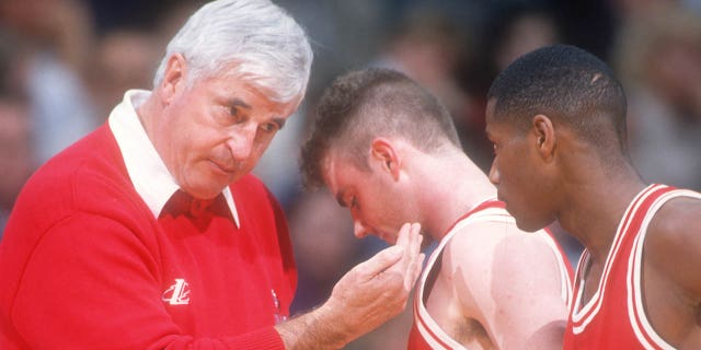 Bobby Knight talks with his Hoosiers players during the NCAA Tournament basketball game against the Oklahoma Sooners on March 12, 1998, in Washington, D.C.