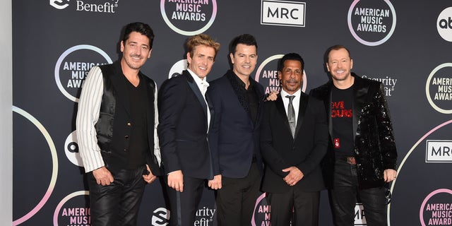 Jonathan Knight, Joey McIntyre, Jordan Knight, Danny Wood and Donnie Wahlberg of New Kids on the Block in 2021.