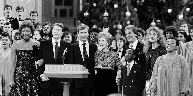 Natalie Cole, President Ronald Reagan, NBC News Tom Brokaw, First Lady Nancy Reagan, student singer, Pat Boone, Amy Grant