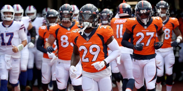 Faion Hicks #29 of the Denver Broncos runs to the field prior to a preseason game against the Buffalo Bills at Highmark Stadium on August 20, 2022 in Orchard Park, New York.