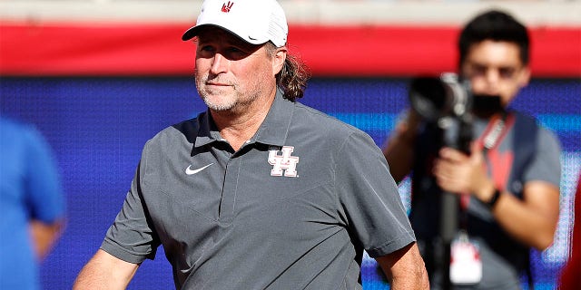 Dana Holgorsen coaches the Houston Cougars