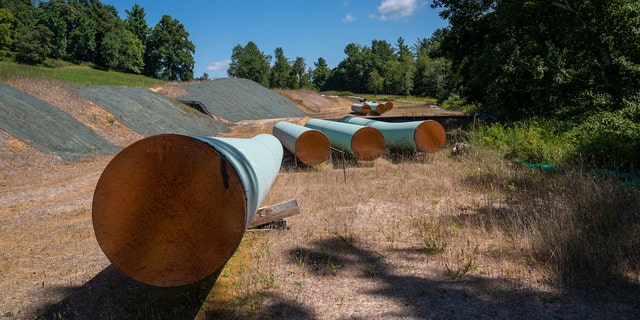Sections of steel pipe laid out in Virginia