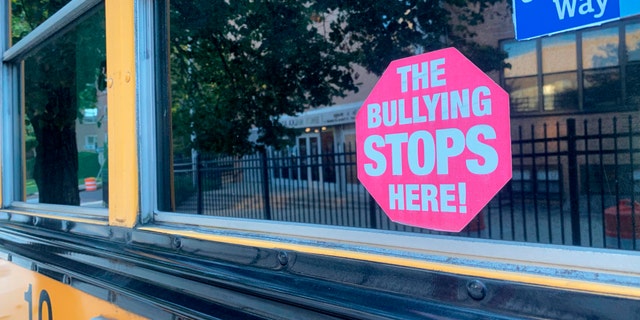 The Bullying Stops Here sign on School Bus, Queens, New York.