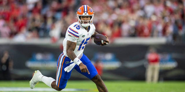 Anthony Richardson of the Gators runs for yards against the Georgia Bulldogs at TIAA Bank Field on October 29, 2022 in Jacksonville, Florida.