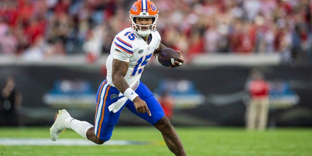 Anthony Richardson of the Gators runs for yardage against the Georgia Bulldogs at TIAA Bank Field on Oct. 29, 2022, in Jacksonville, Florida.