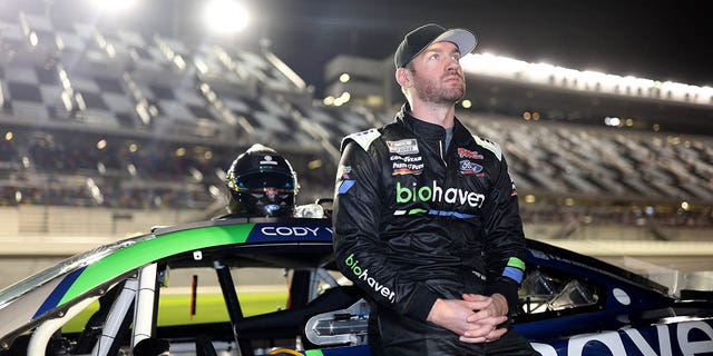 Cody Ware, driver of the #51 Biohaven/Jacob Co. Ford, looks on during qualifying for the Busch Light Pole at Daytona International Speedway on February 15, 2023 in Daytona Beach, Florida. 