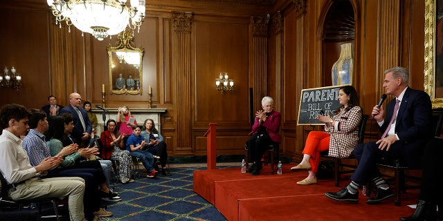 House Speaker Kevin McCarthy, right, told Loudon County father Scott Smith, "Every parent in America stood with you," during an event to introduce the Parents Bill of Rights at the U.S. Capitol on March 1, 2023, in Washington, D.C.