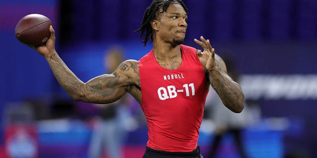 Anthony Richardson participates in a drill during the NFL Combine at Lucas Oil Stadium on March 4, 2023, in Indianapolis, Indiana. 