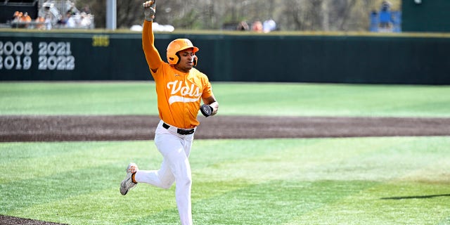 Christian Moore celebrates scoring a winning run