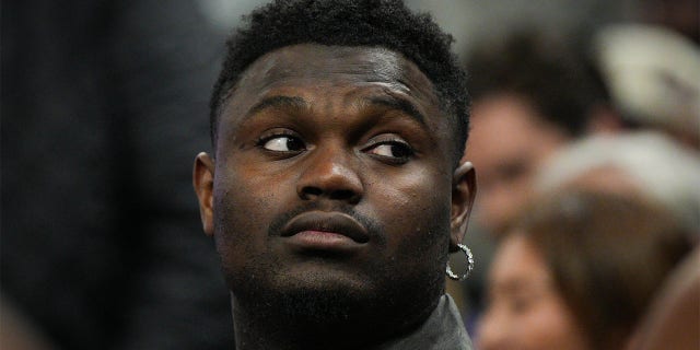 Zion Williamson of the New Orleans Pelicans, out due to injury, watches from the bench during a game against the Golden State Warriors at Chase Center March 28, 2023, in San Francisco.  