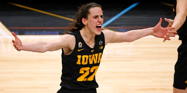 Caitlin Clark, #22, of the Iowa Hawkeyes celebrates after the Hawkeyes defeated the South Carolina Gamecocks 77-73 during Game Four of the 2023 NCAA Women's Basketball Tournament semifinals at the American Airlines Center on March 31, 2023, in Dallas, Texas. 